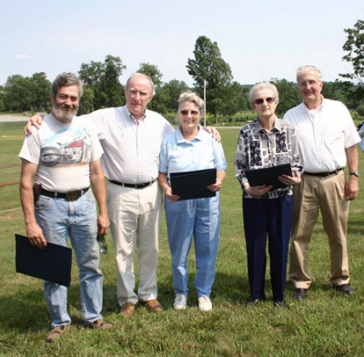 State Sen. Stephen M. Brewer presented certificates to members of the Adams, Briggs and Walker families.